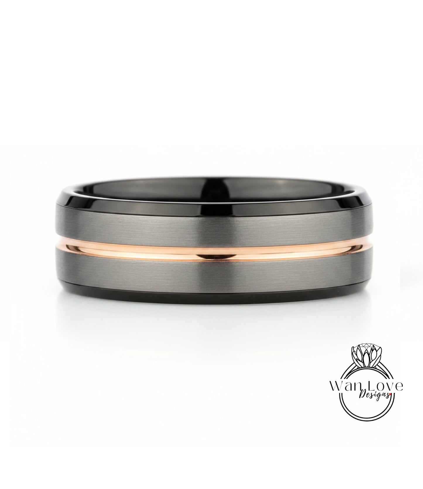 A silver and black ring with a thin gold stripe.