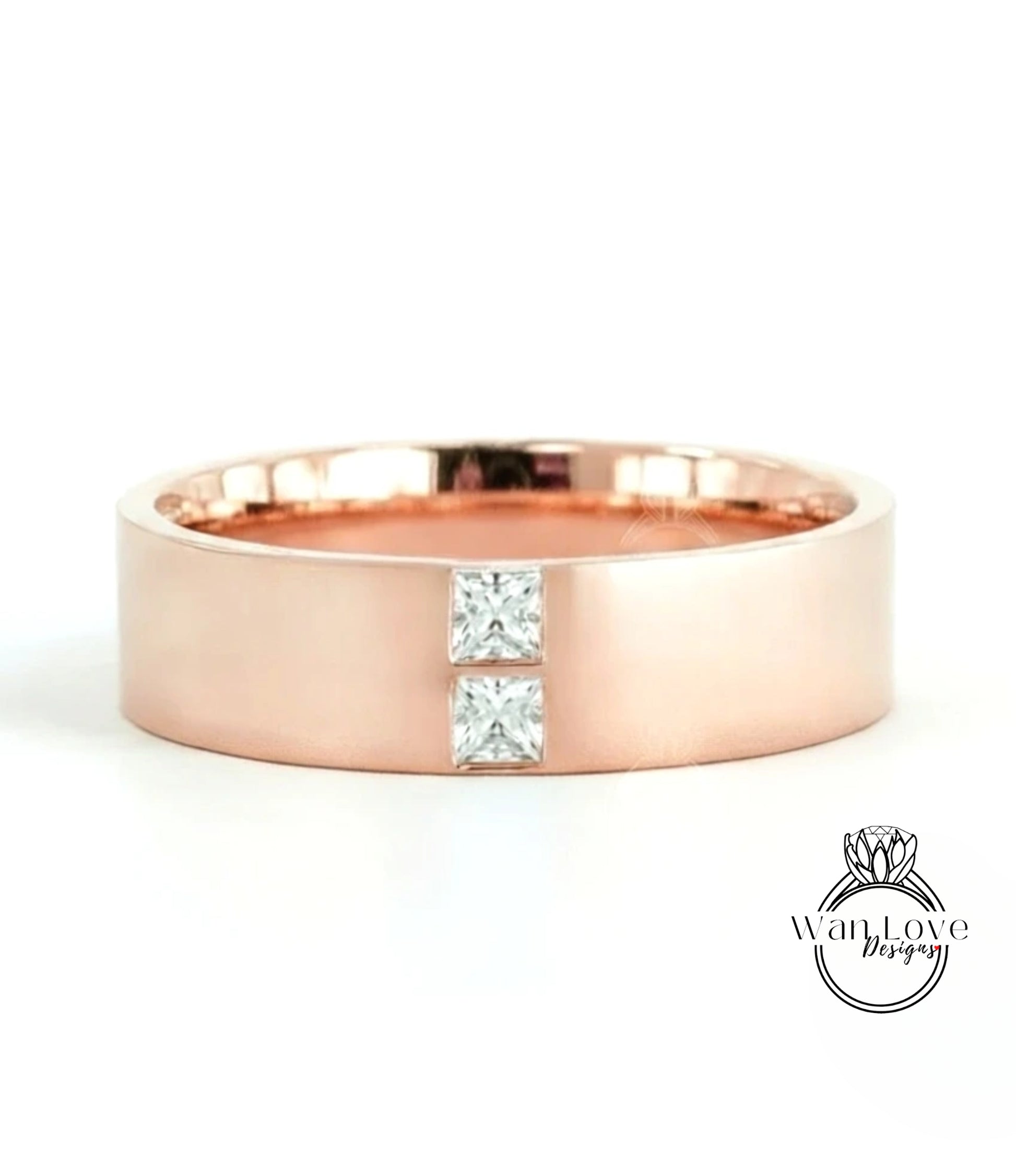 A rose gold ring with a large diamond set in the center.