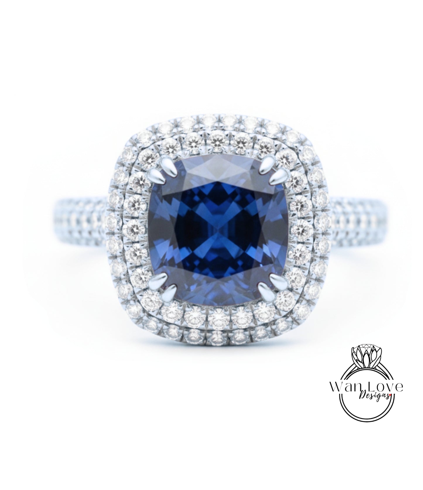 A stunning diamond engagement ring with a large blue gemstone set in a halo of smaller diamonds, surrounded by a sparkling bezel of diamonds.