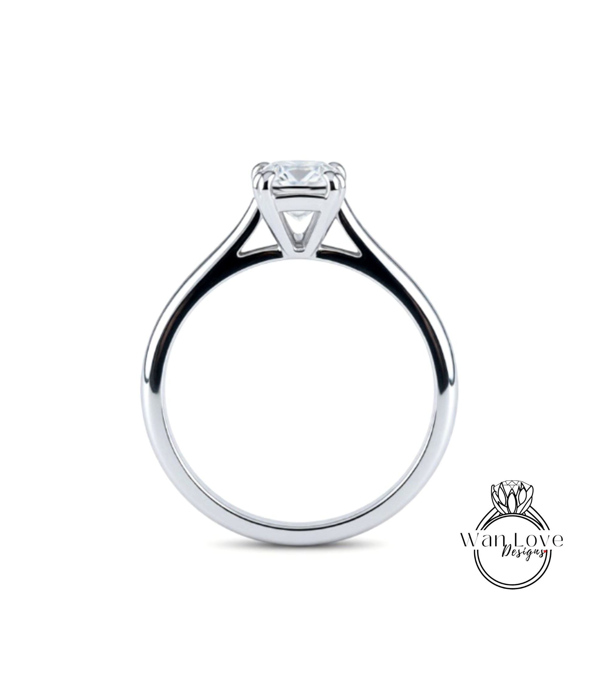 A silver engagement ring with a large diamond set in the center.