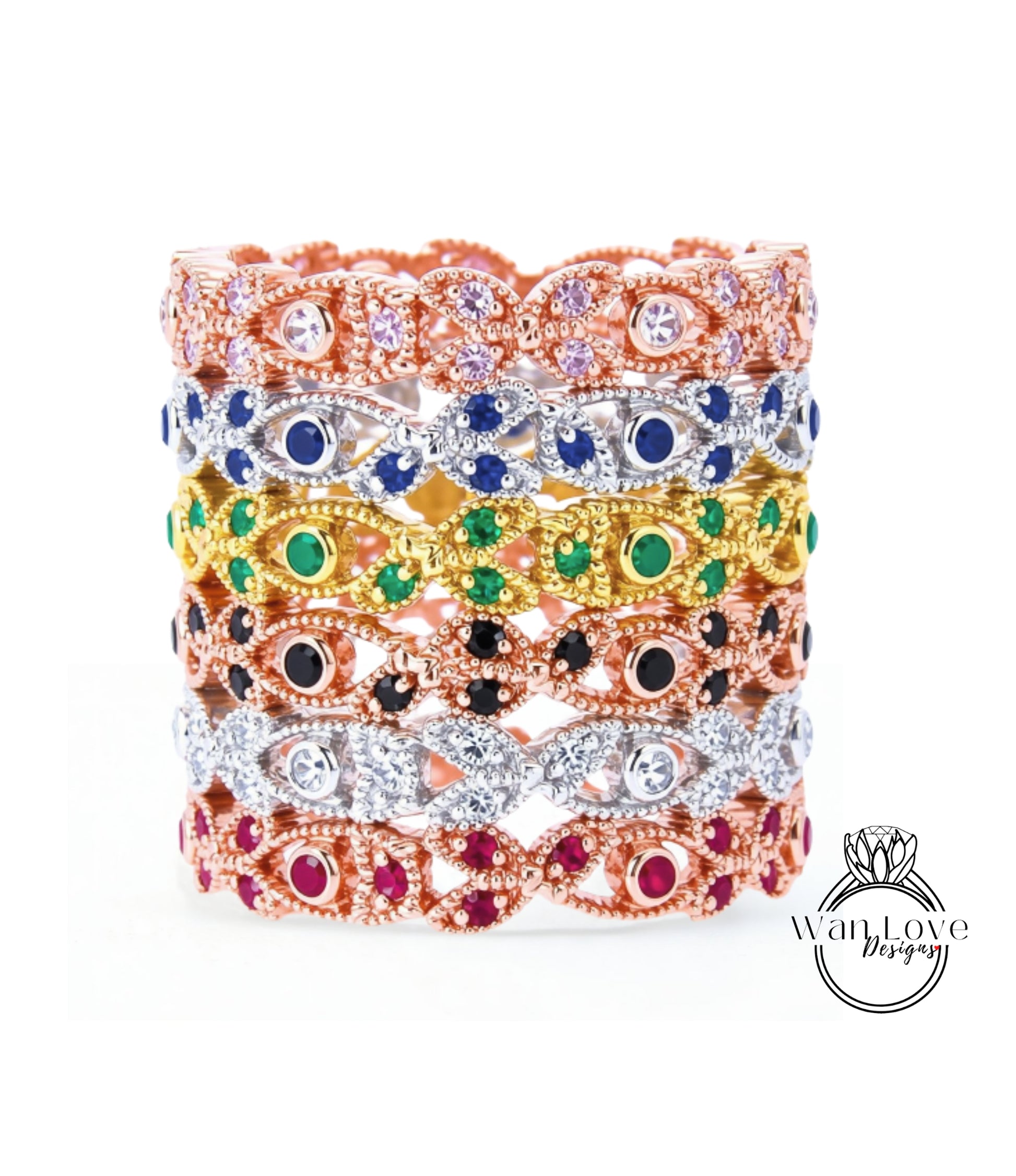 A stack of colorful, ornate rings with various gemstones and designs.