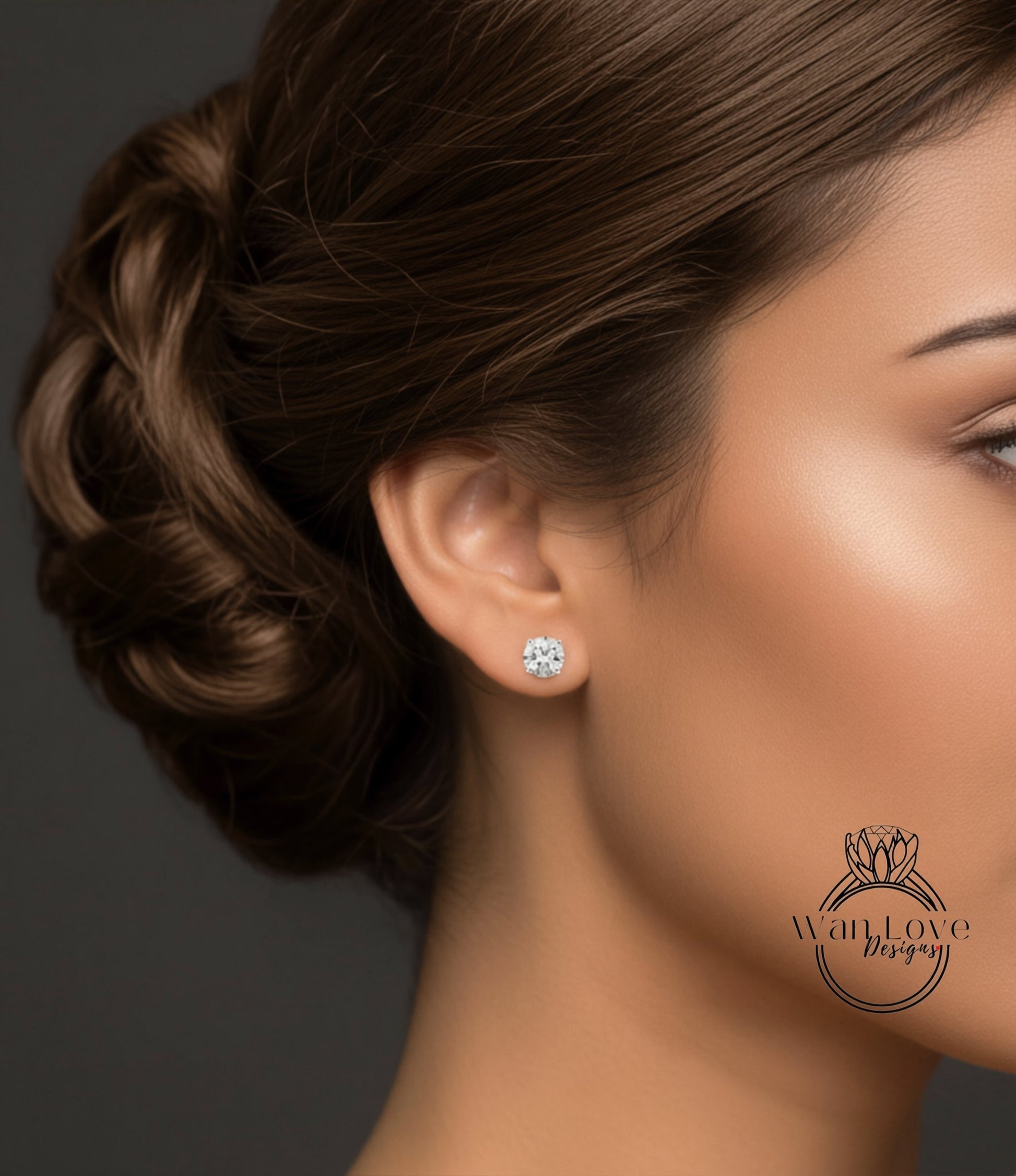 A close-up of a woman's face, focusing on her ear with a diamond earring.