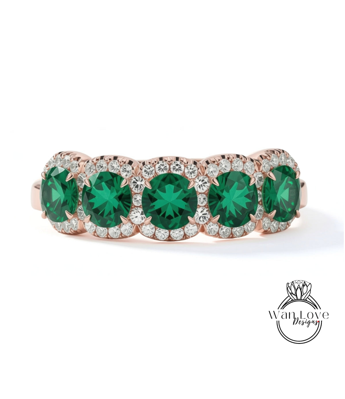 A ring with a row of green gemstones set in a rose gold band, with small diamonds around the edges.