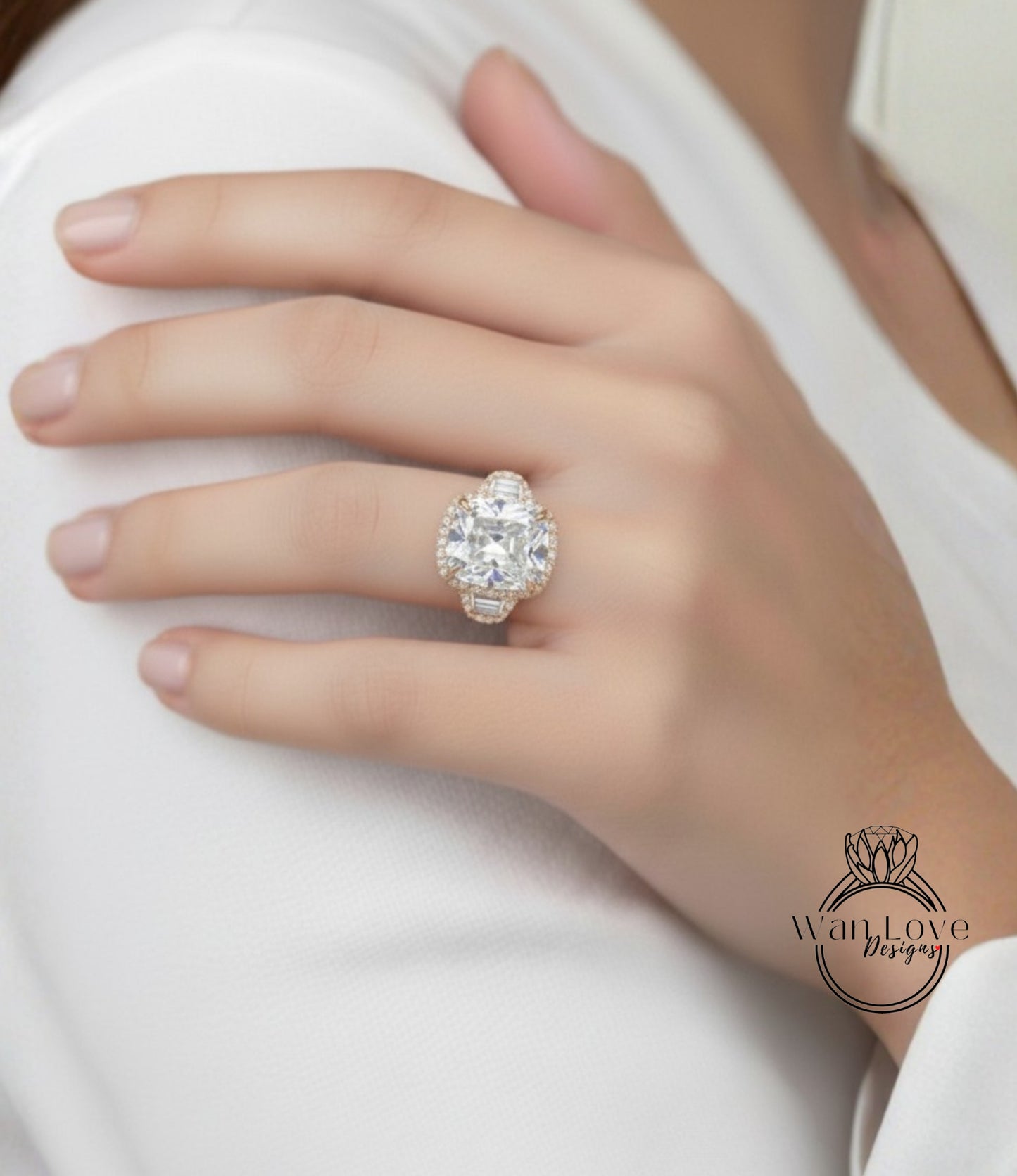 A close-up of a person's hand wearing a large, ornate diamond ring.