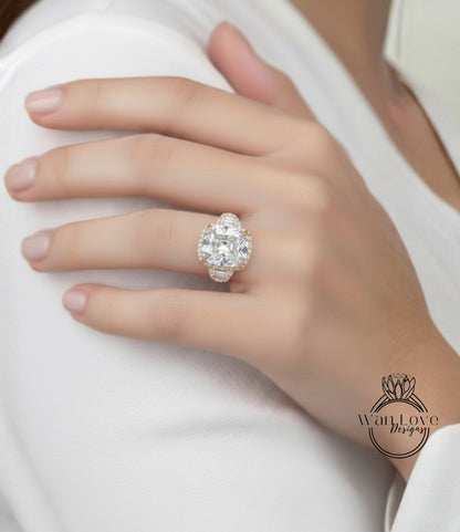 A close-up of a person's hand wearing a large, ornate diamond ring.