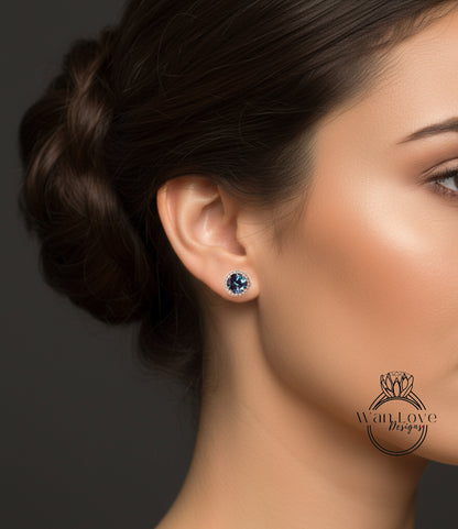 A close-up of a woman's face, focusing on her earrings and hair.