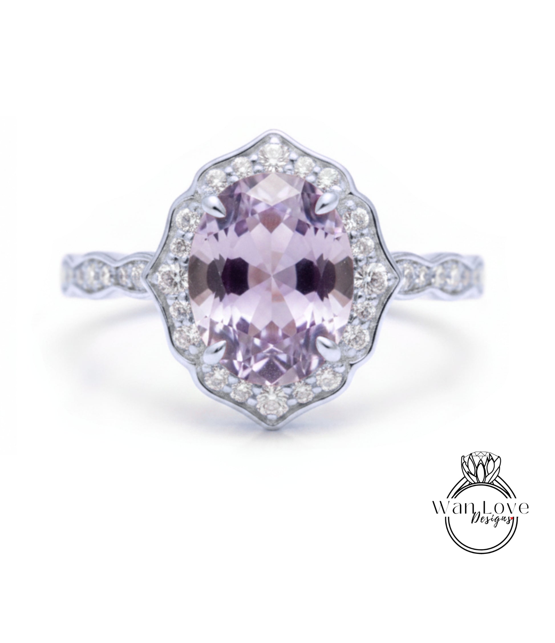 A beautiful ring featuring a large oval-shaped gemstone surrounded by a halo of smaller diamonds.