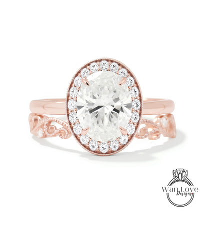 A rose gold ring with a large oval-shaped diamond set in the center, surrounded by smaller diamonds.