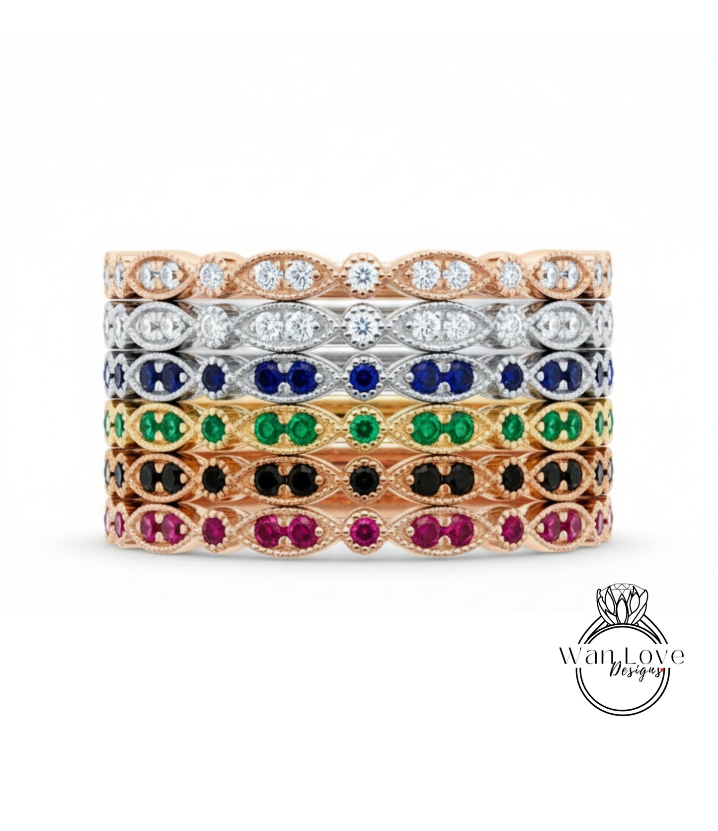 A stack of rings with various colored gemstones, including diamonds and colored gemstones, set in a gold or silver band.