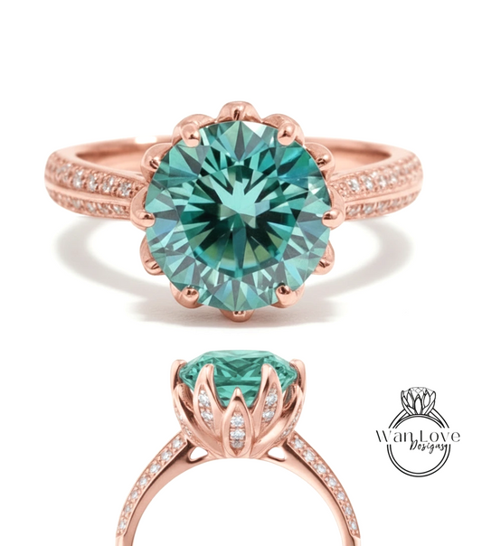 a beautiful rose gold ring with a large, round, blue gemstone set in the center. The ring has a scalloped edge and is adorned with small diamonds around the band.