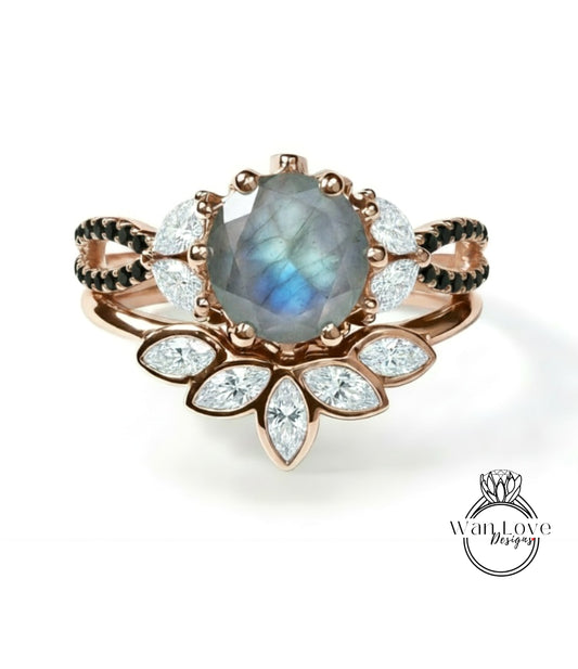 a beautiful engagement ring with a large oval-shaped stone, surrounded by smaller diamonds and a floral design.