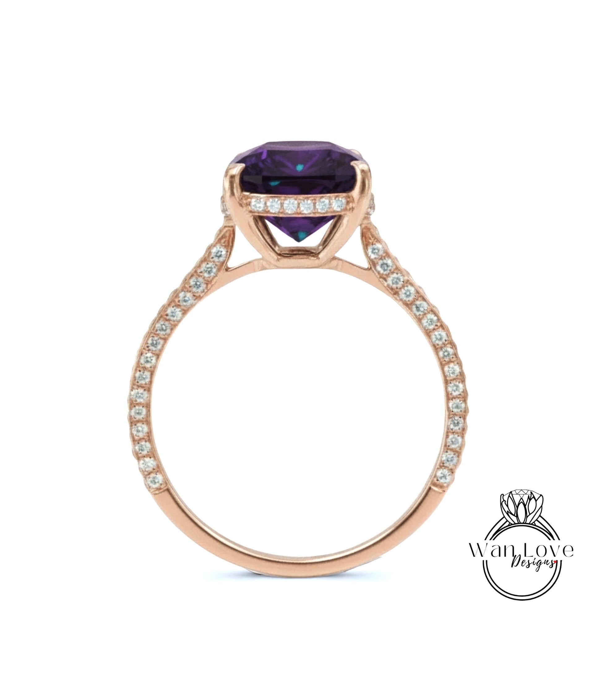 A gold ring with a large purple gemstone set in the center, surrounded by smaller diamonds.