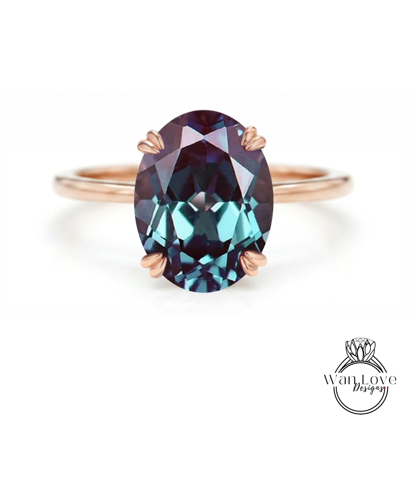 A close-up image of a rose gold ring with a large oval-shaped gemstone set in the center.