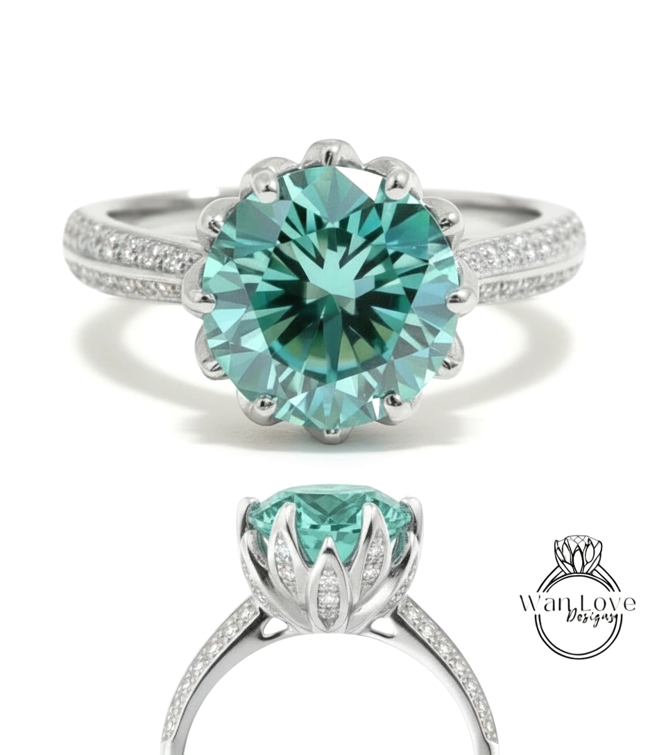 A stunning turquoise diamond engagement ring with a large central gemstone surrounded by smaller diamonds set in a silver band.