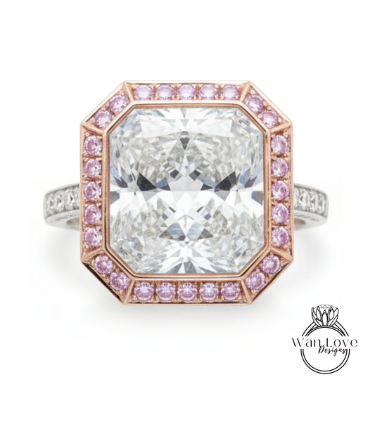 A large, clear gemstone ring with a pink gemstone border around the top edge.
