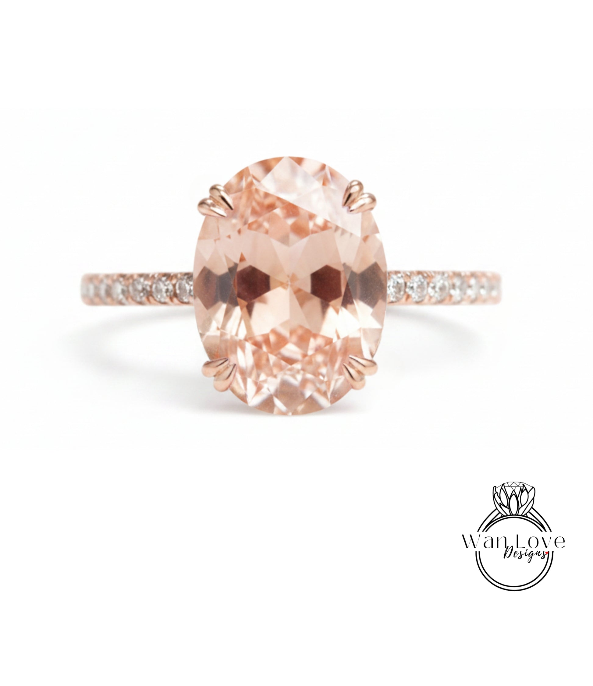 A rose gold ring with a large oval-shaped gemstone set in the center, surrounded by smaller diamonds.