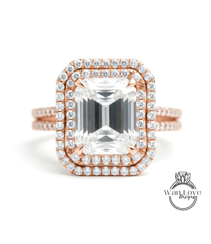 A large, clear diamond engagement ring with a halo of smaller diamonds around the center stone.