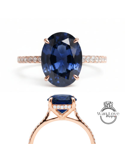 a beautiful blue gemstone ring with a large oval-shaped blue gemstone set in a rose gold band.