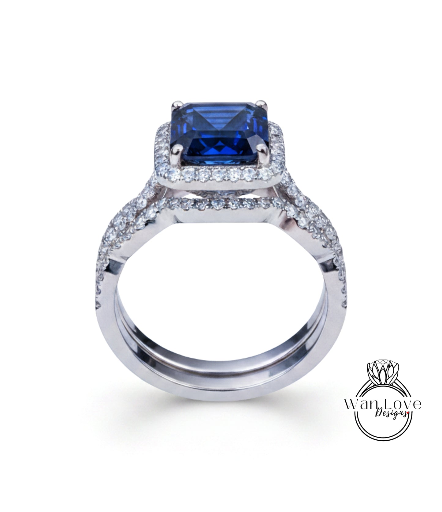A silver ring with a large blue gemstone, likely a sapphire, set in a halo of smaller diamonds.