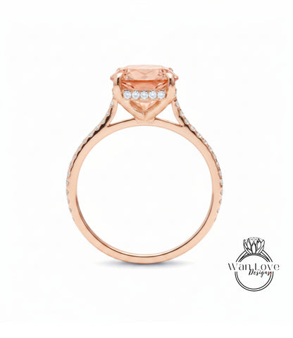 A rose gold engagement ring with a large, round-cut diamond set in the center, surrounded by smaller diamonds.