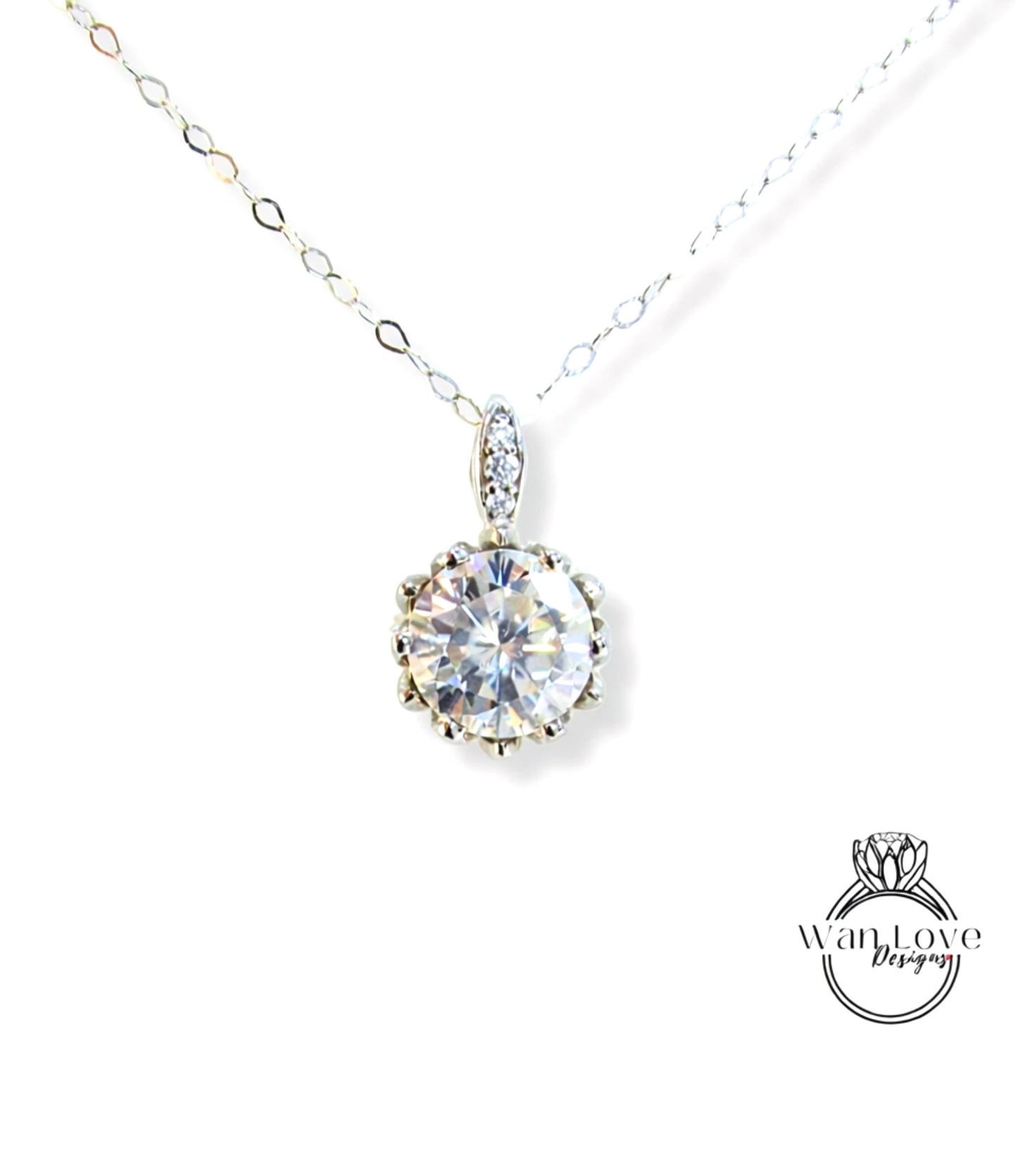 A necklace with a large, clear gemstone pendant, possibly a diamond, hanging from a chain.