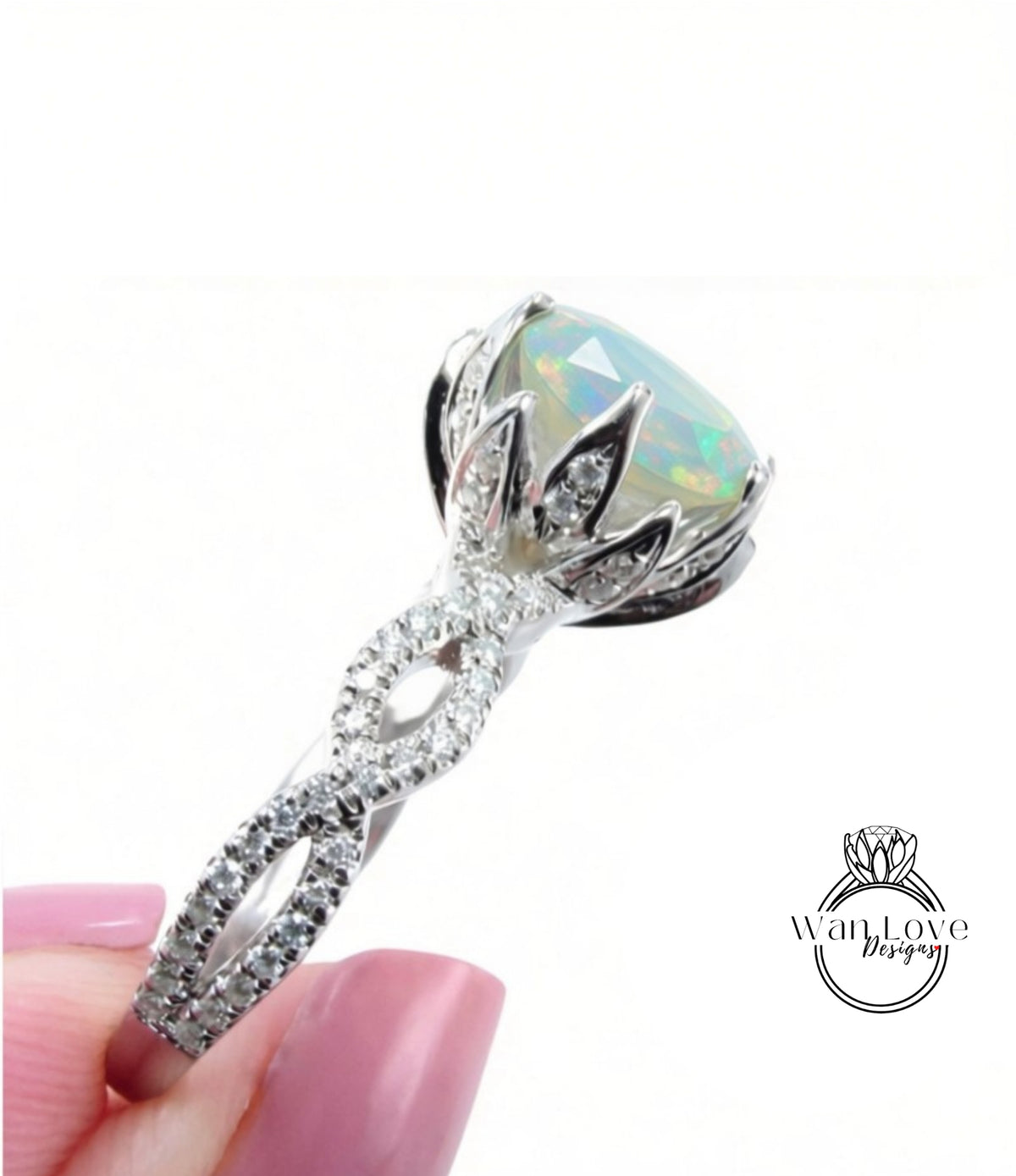 A close-up of a silver ring with a large opal gemstone, showcasing the intricate design and sparkling gemstones.