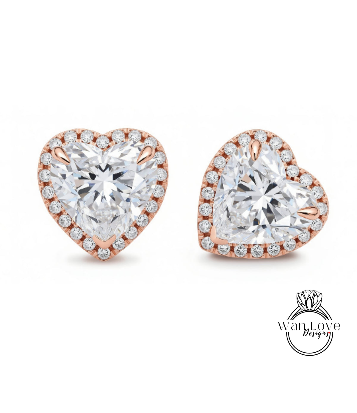 two heart-shaped earrings with large, clear gemstones set in a rose gold frame.