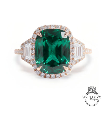 A large, oval-shaped green gemstone set in a gold ring with smaller diamonds around the edges.