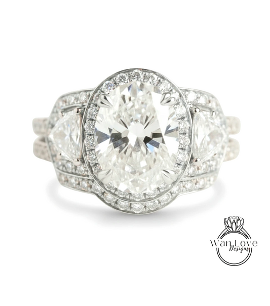 A stunning diamond engagement ring with a large oval-shaped diamond at the center, surrounded by smaller diamonds and set in a silver band.