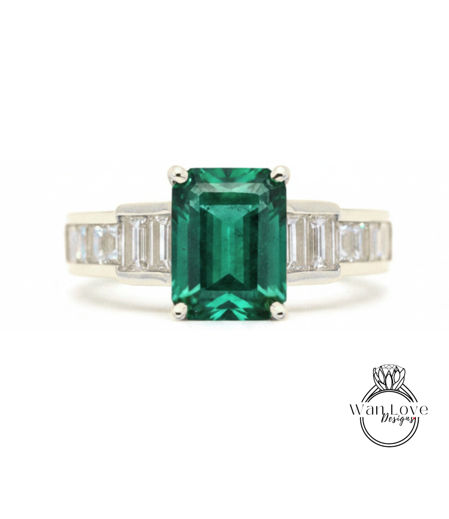 A ring featuring a large, vibrant green gemstone surrounded by smaller diamonds set in a silver band.