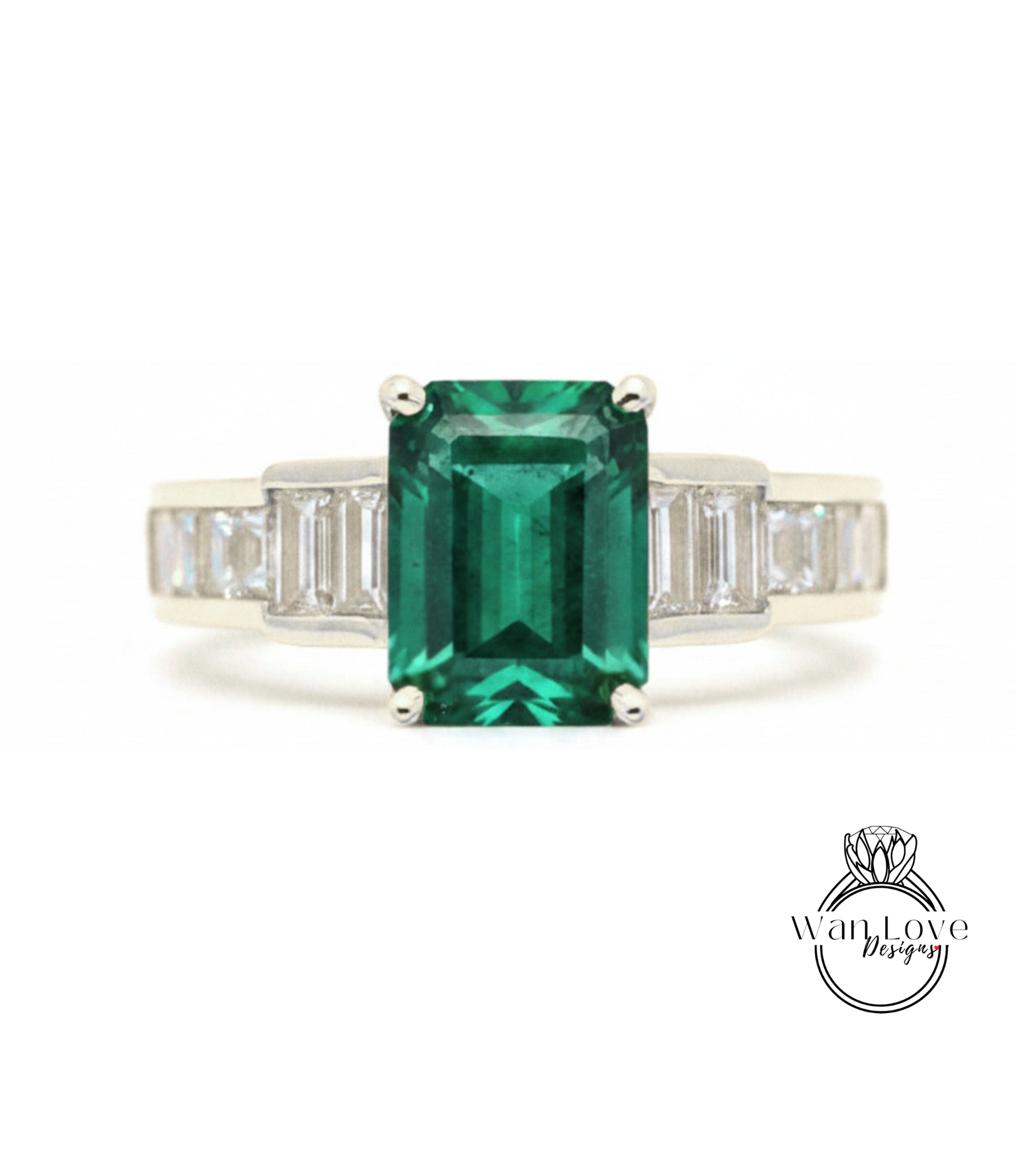 A ring featuring a large, vibrant green gemstone surrounded by smaller diamonds set in a silver band.