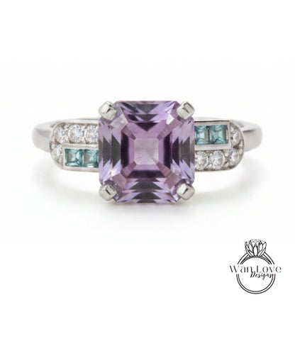 a ring with a large purple gemstone, surrounded by smaller blue gemstones.