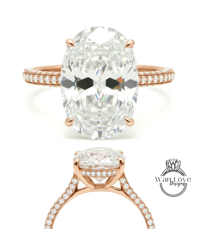 a large, oval-shaped diamond engagement ring with a rose gold band and a row of small diamonds along the band.