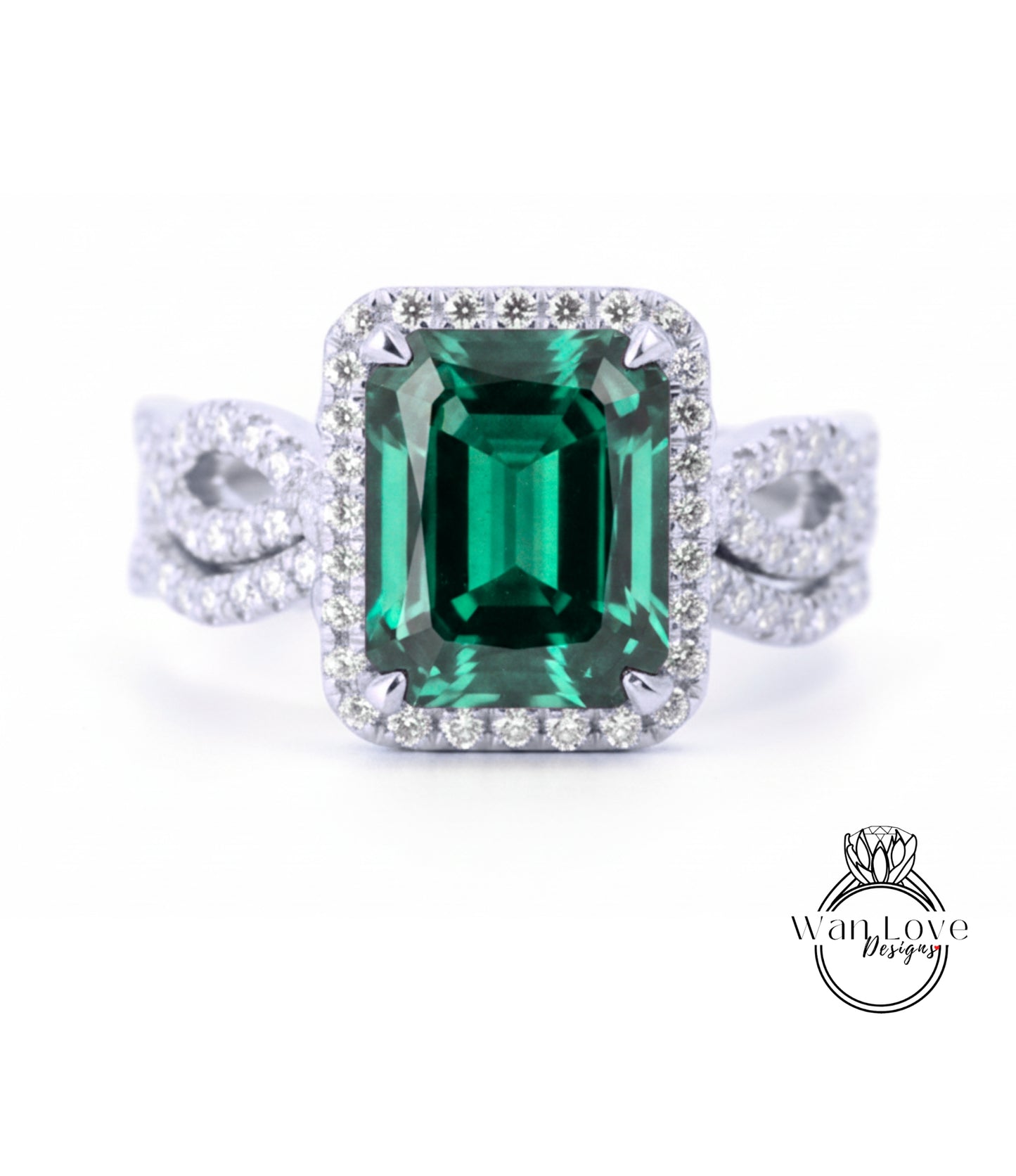 A stunning ring featuring a large, vibrant green gemstone surrounded by a halo of sparkling diamonds.