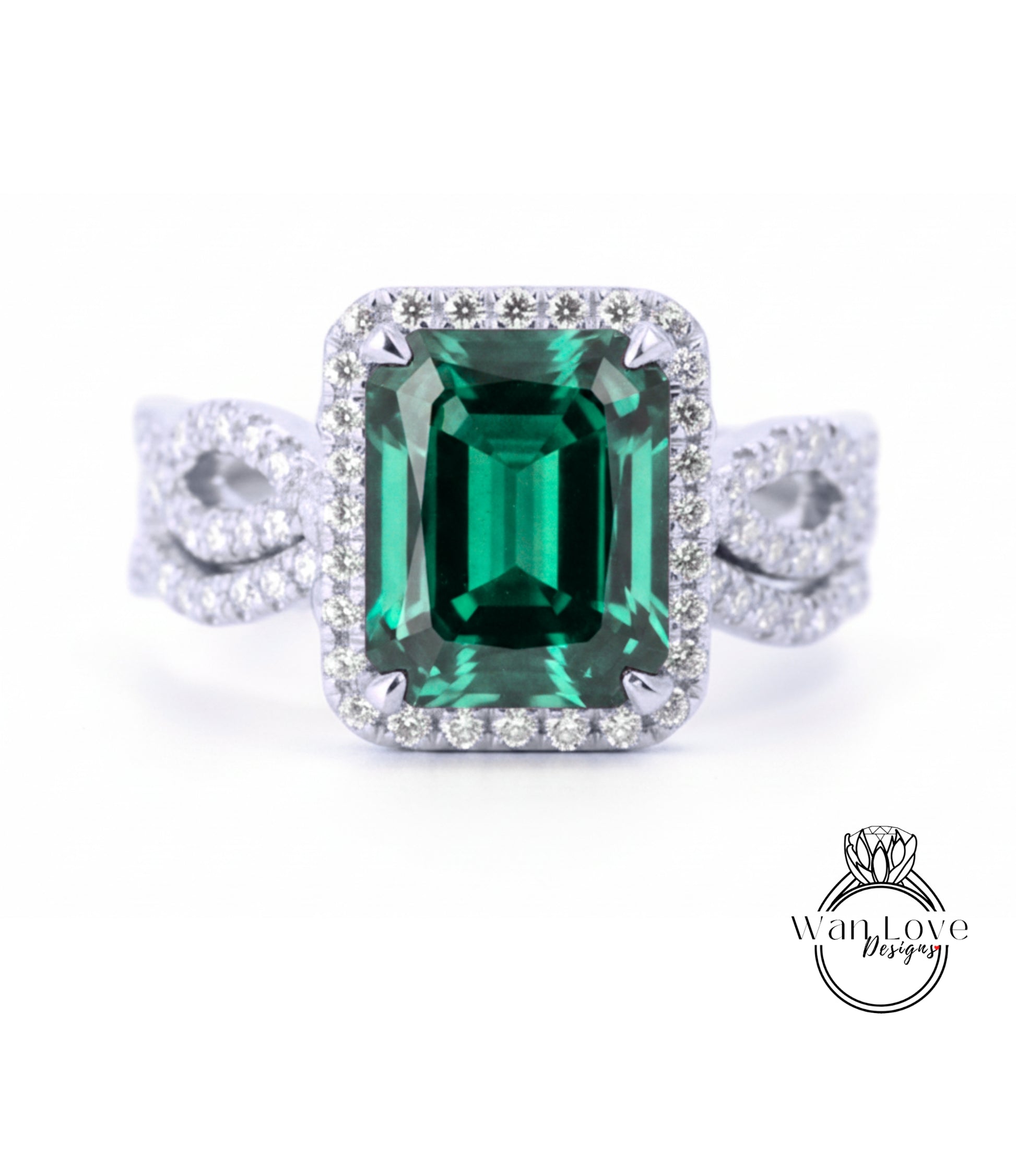 A stunning ring featuring a large, vibrant green gemstone surrounded by a halo of sparkling diamonds.