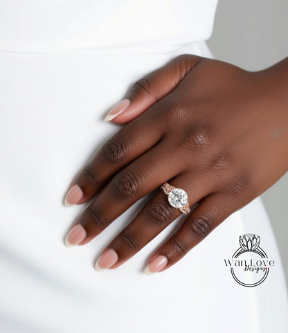 A close-up of a person's hand wearing a large, round diamond engagement ring.