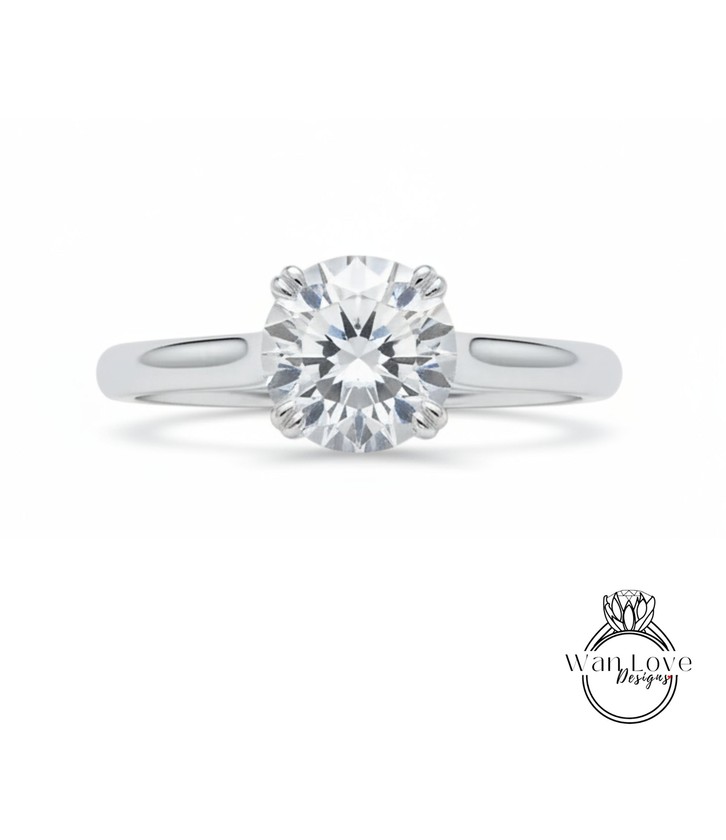A close-up view of a diamond engagement ring with a large, brilliant-cut diamond set in a silver band.