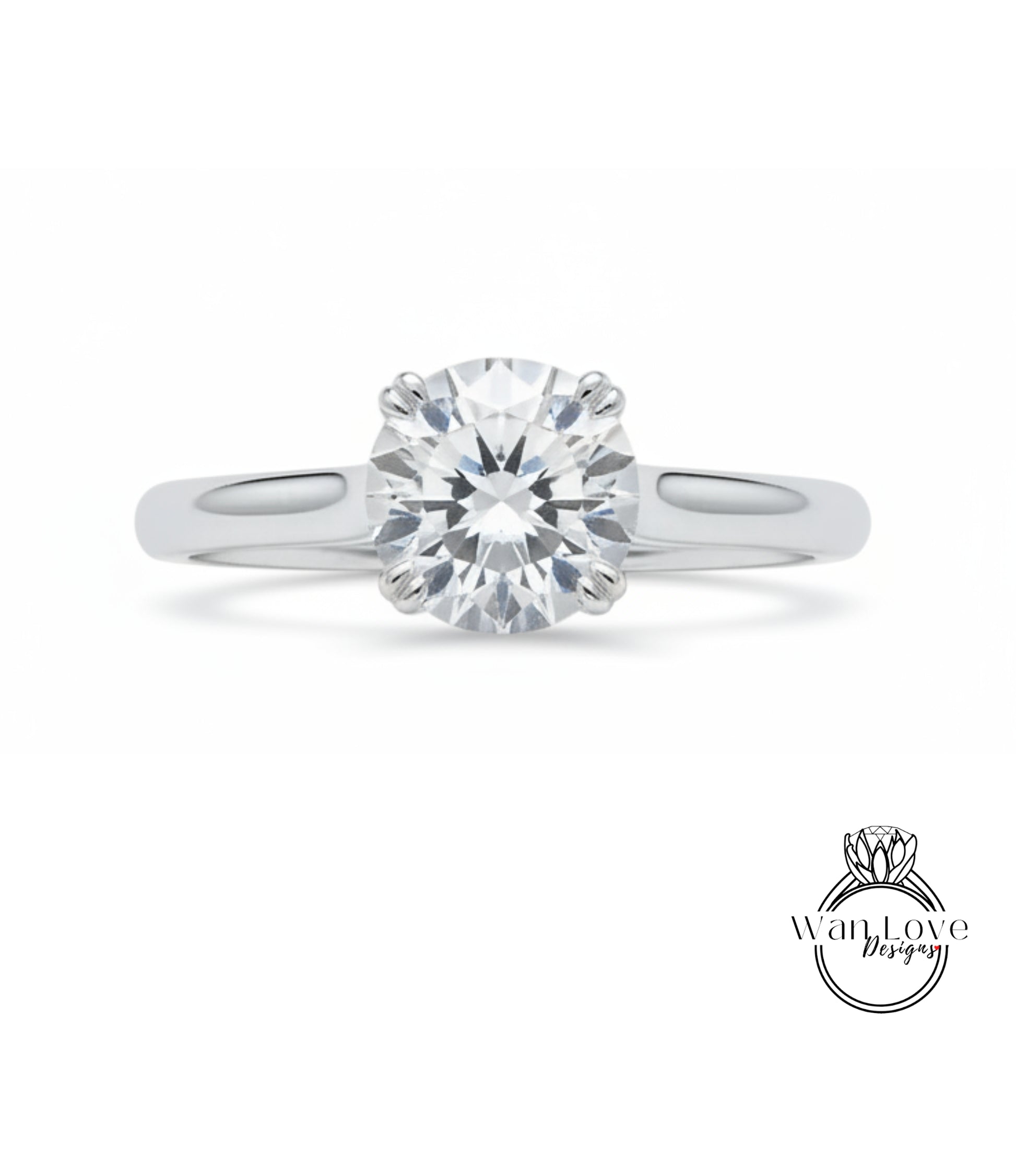 A close-up view of a diamond engagement ring with a large, brilliant-cut diamond set in a silver band.