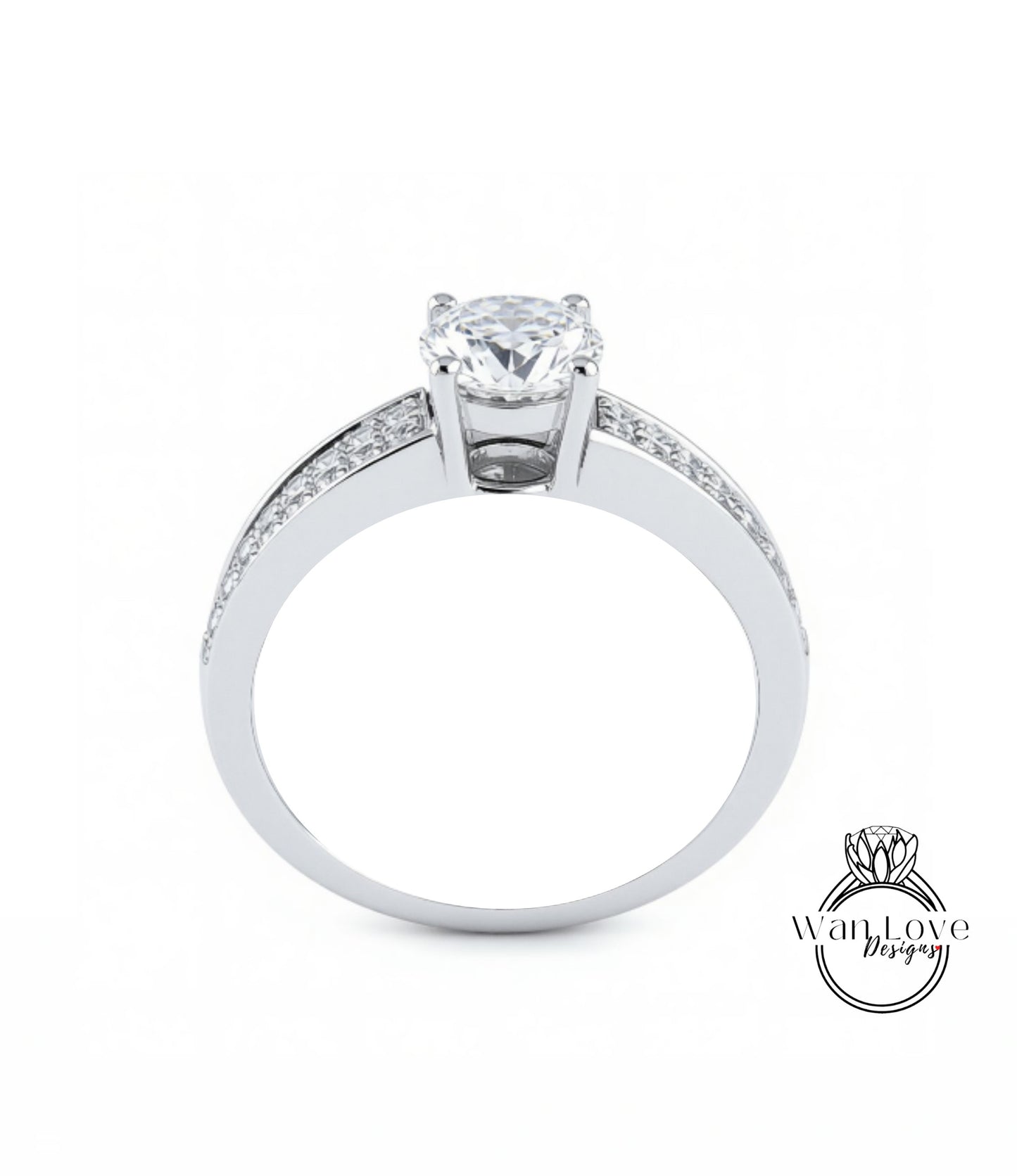A silver engagement ring with a large central diamond and smaller diamonds along the band.