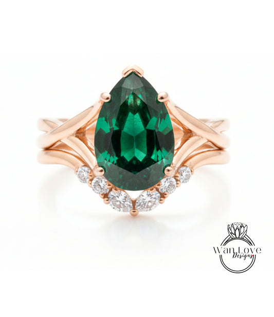 a beautiful engagement ring with a large, vibrant green gemstone set in a rose gold band.