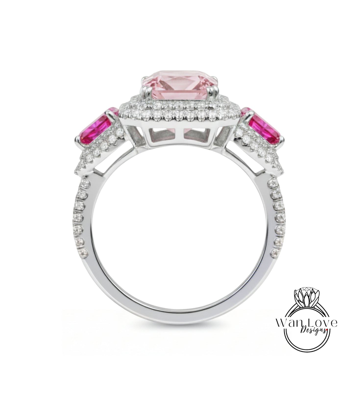 A silver ring with a large pink gemstone at the center, surrounded by smaller pink gemstones.