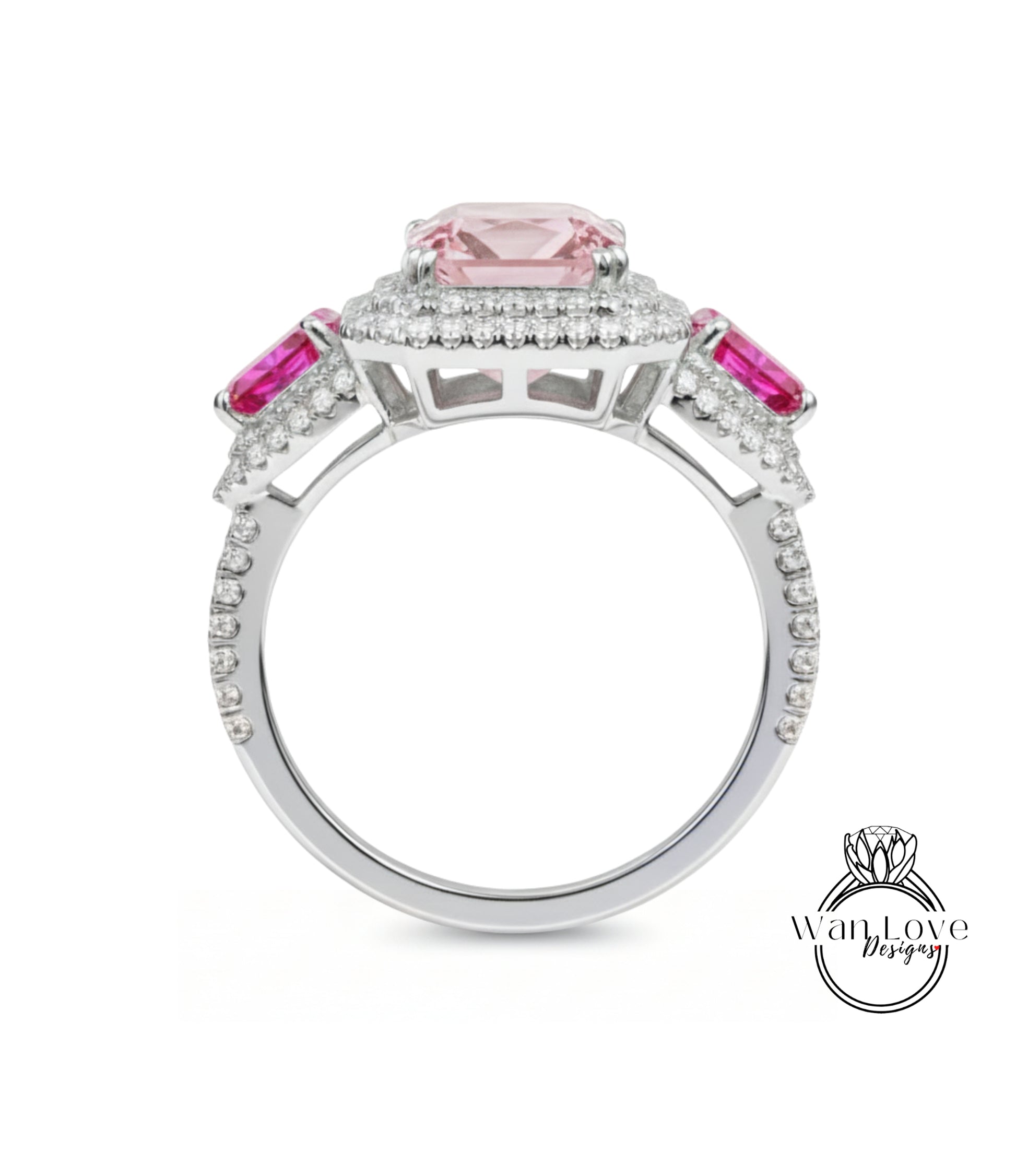 A silver ring with a large pink gemstone at the center, surrounded by smaller pink gemstones.