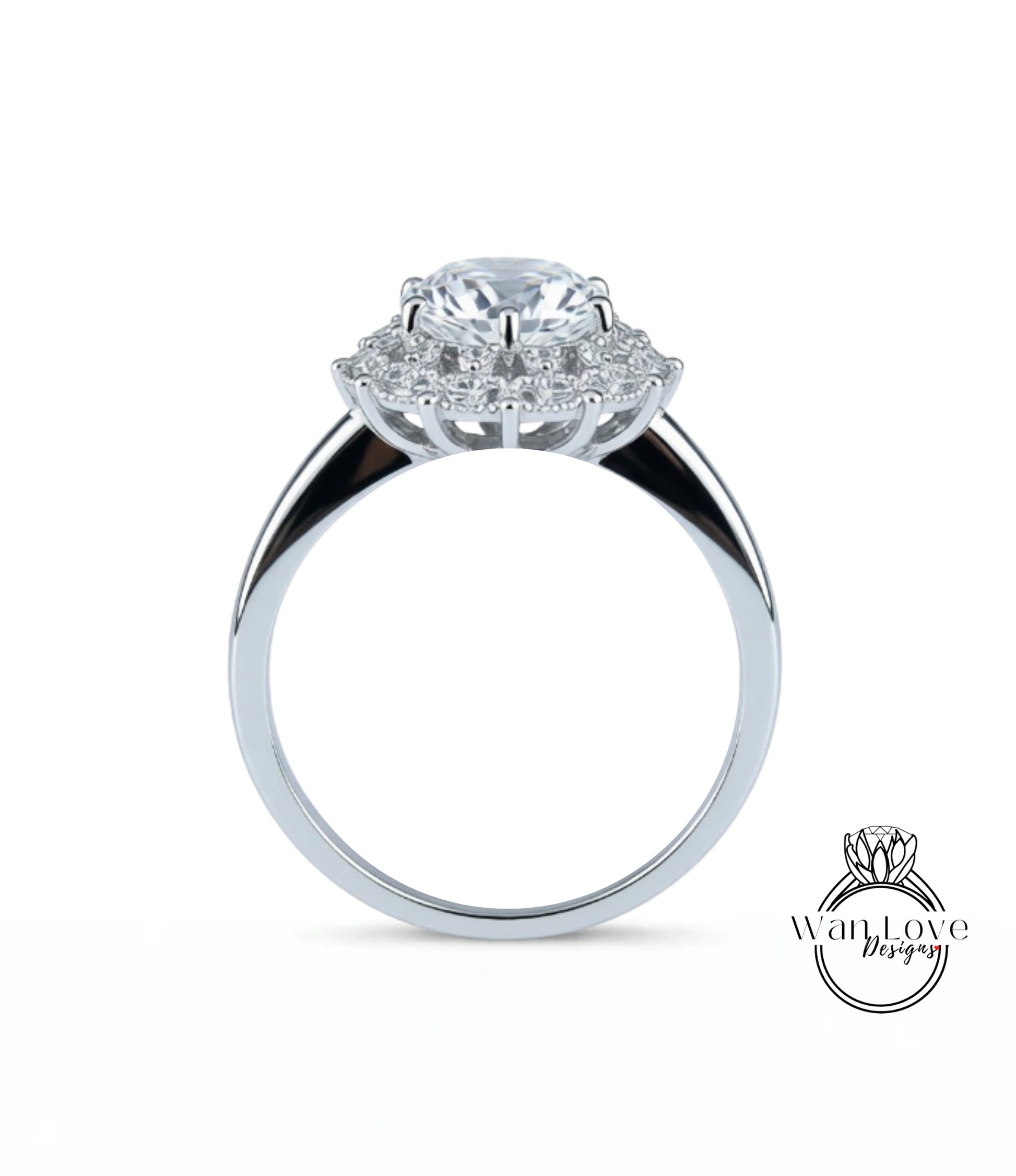 A silver ring with a large central diamond surrounded by smaller diamonds, showcasing the intricate design and craftsmanship of the piece.