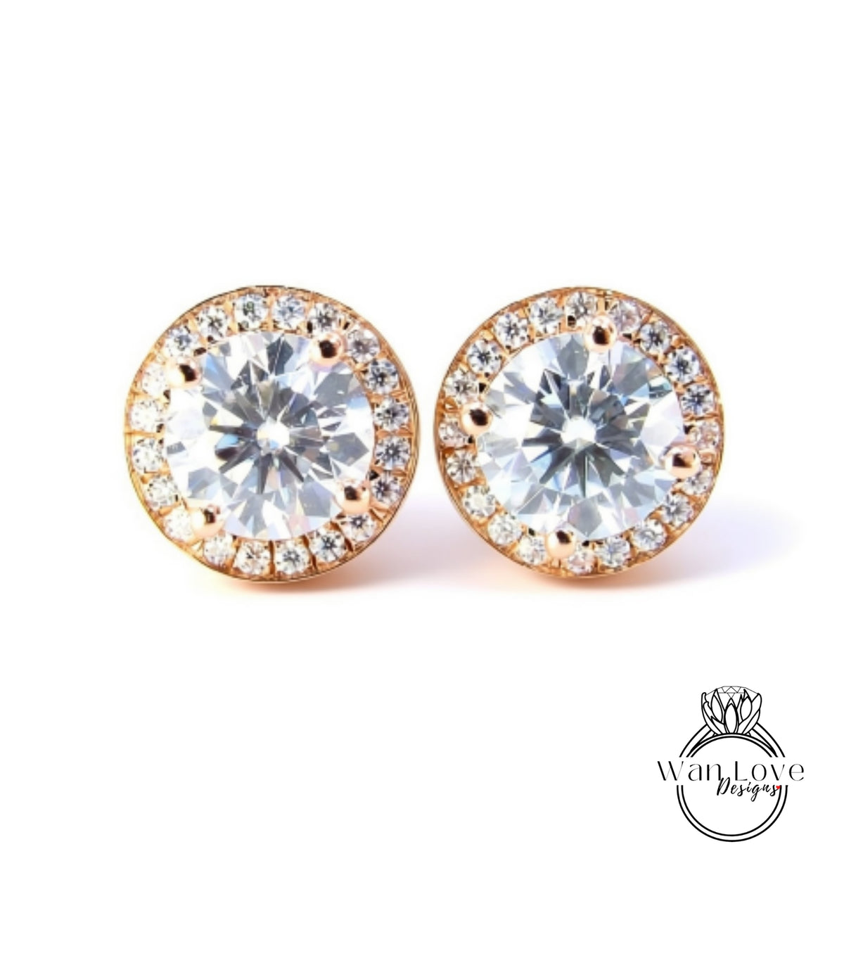 A pair of elegant earrings with large, clear gemstones set in a gold-toned metal frame.