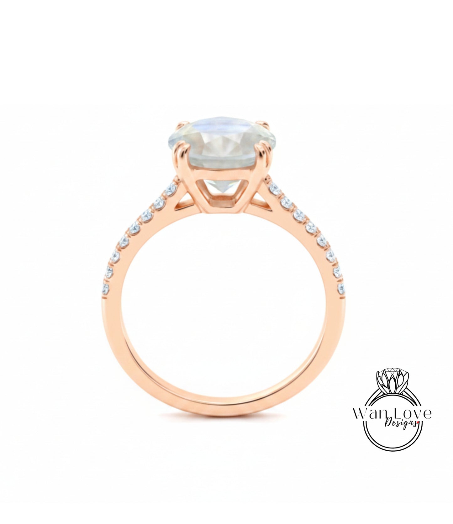 A gold ring with a large, clear gemstone set in the center, surrounded by smaller diamonds along the band.