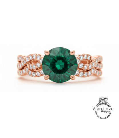 A rose gold ring with a large green gemstone at the center, surrounded by smaller diamonds.