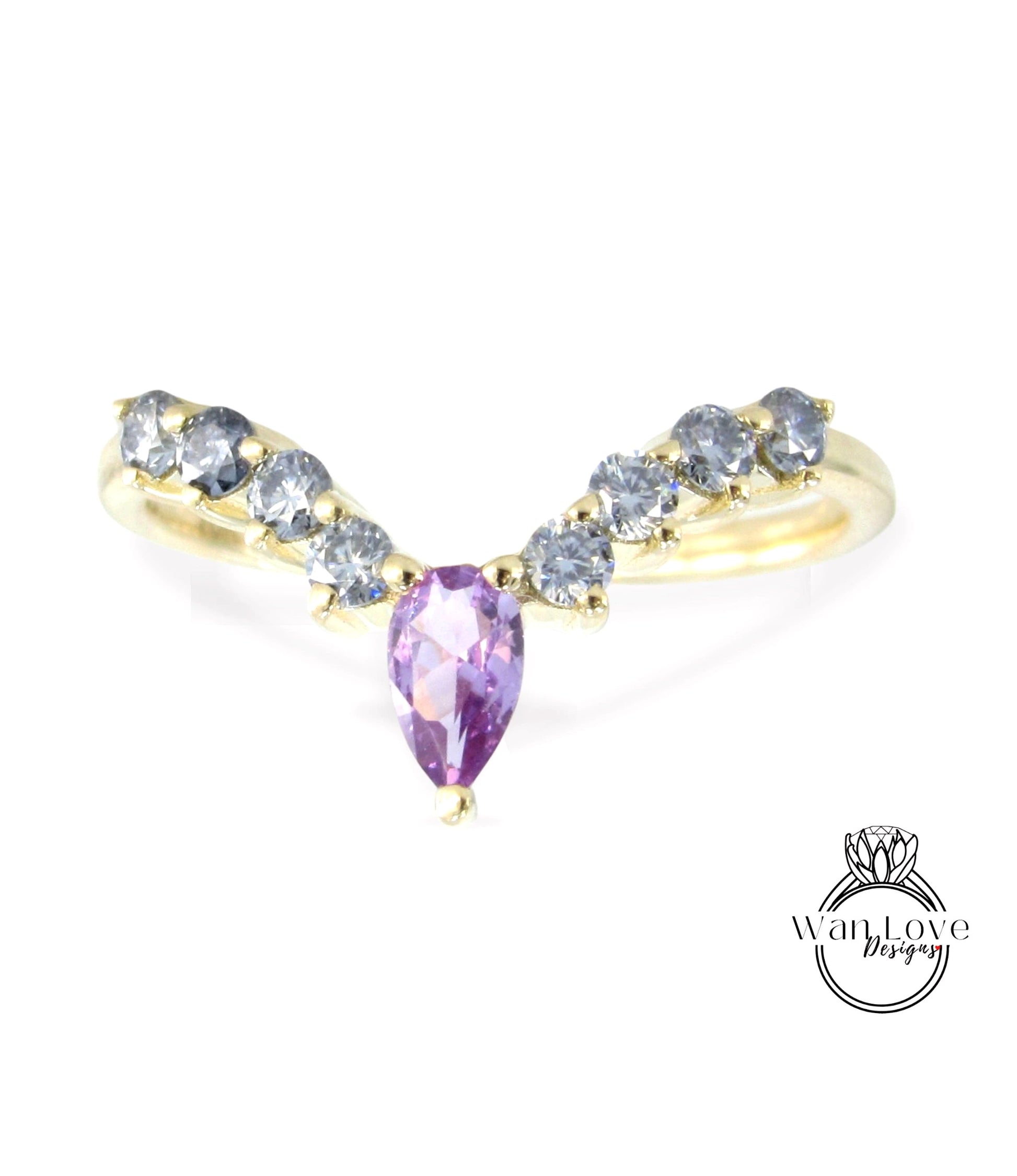 A gold ring with a large purple gemstone in the center, surrounded by smaller diamonds.