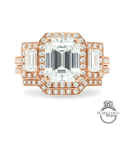 A stunning engagement ring with a large central diamond surrounded by smaller diamonds on the sides, set in a rose gold band.