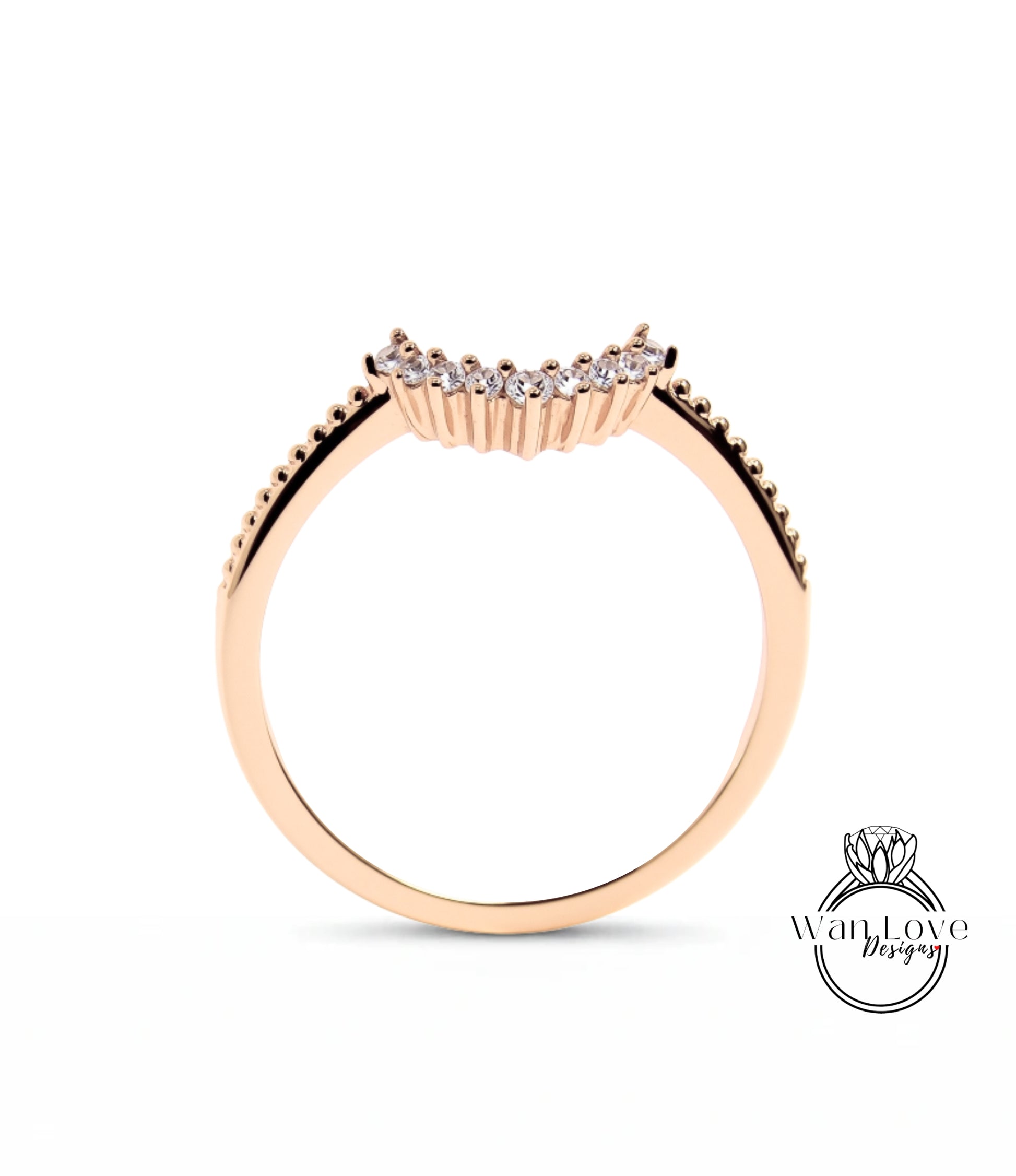 A gold ring with a diamond-encrusted band.