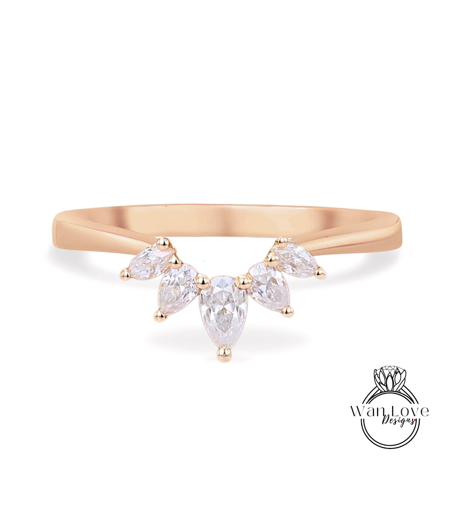 A gold ring with a large, clear gemstone set in the center, surrounded by smaller, clear gemstones.